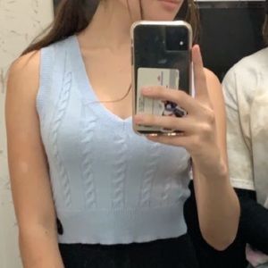 light blue sweater vest